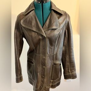 Retro/vintage brown leather jacket with white stitching